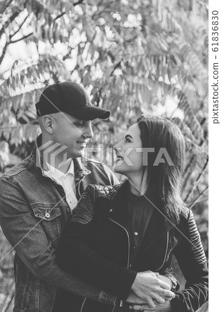 Happy couple in love on a background of yellow 61836830