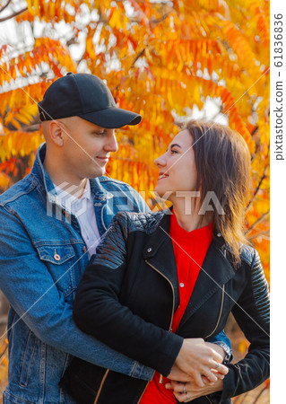 Happy couple in love on a background of yellow Happy couple in love on a background of yellow 61836836