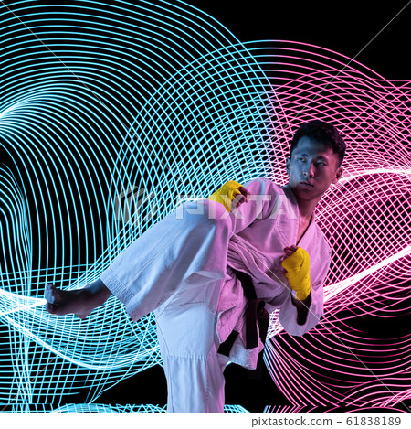 Creative sport and neon waves on dark neon lighted line background Creative sport and neon waves on dark neon lighted line background 61838189