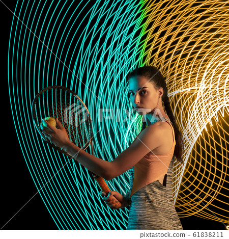 Creative sport and neon waves on dark neon lighted line background Creative sport and neon waves on dark neon lighted line background 61838211