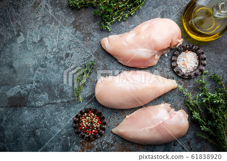 Raw chicken breast 61838920