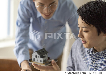First-class architect of a design office considering the layout of renovation work for a detached house First-class architect of a design office considering the layout of renovation work for a detached house 61840409