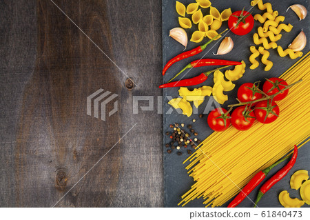 Spaghetti, tomatoes, chili peppers and spices Spaghetti, tomatoes, chili peppers and spices 61840473