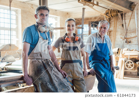 Carpenter family business with generations in the workshop Carpenter family business with generations in the workshop 61844173
