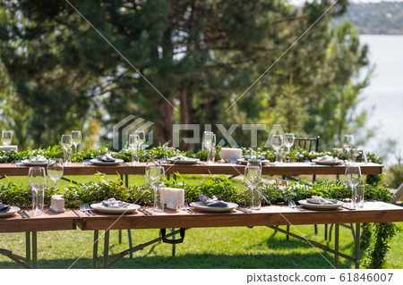 Preparing for an open-air party. Decorated served Preparing for an open-air party. Decorated served 61846007