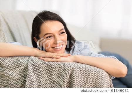 Girl listening to music online on smartphone 61846081