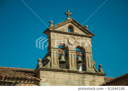 Stone tower with two bronze bells in Caceres 61846186