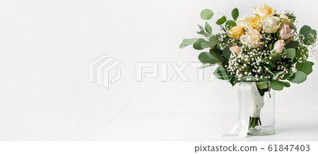 Flower composition, wedding bouquet with ribbon, boutonniere Flower composition, wedding bouquet with ribbon, boutonniere 61847403