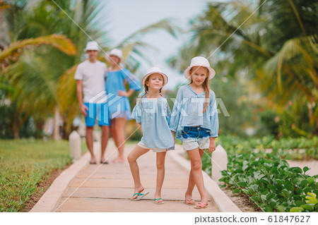 Young family on vacation have a lot of fun Young family on vacation have a lot of fun 61847627