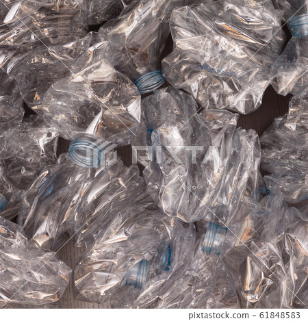 Plastic bottles background. Empty bottles on black 61848583