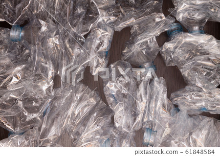 Plastic bottles background. Empty bottles on black 61848584
