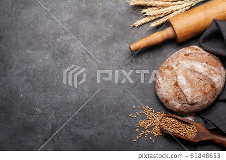 Bread with wheat, flour and cooking utensils Bread with wheat, flour and cooking utensils 61848653