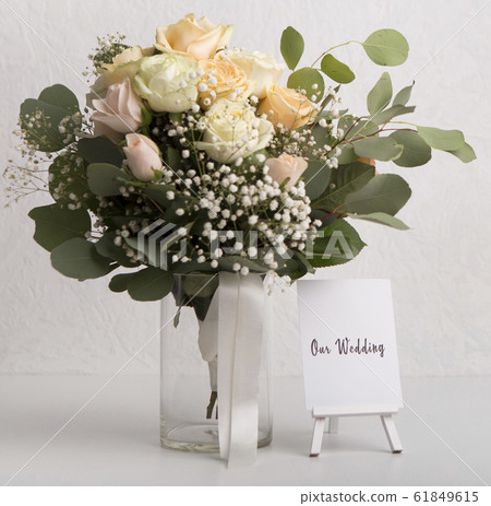 Beautiful bridal bouquet composition on white background 61849615