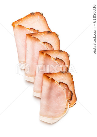 Sliced smoked ham. Tasty pork meat. 61850336