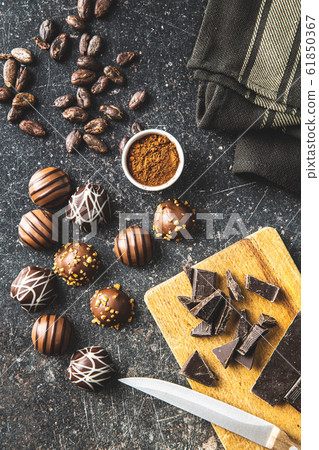 Praline bonbons. Chocolate truffles and cocoa 61850367