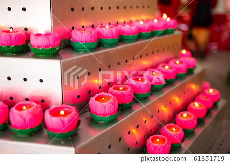 Icon lamps in a Chinese temple left by visitors Icon lamps in a Chinese temple left by visitors 61851719