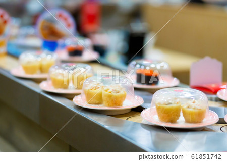 Fresh sushi rolls in an asian food store 61851742