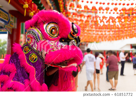 Chinese New Year celebration in a Chinese temple. Chinese New Year celebration in a Chinese temple. 61851772
