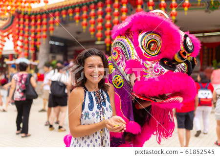 Chinese New Year celebration in a Chinese temple. Chinese New Year celebration in a Chinese temple. 61852545