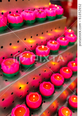 Icon lamps in a Chinese temple left by visitors Icon lamps in a Chinese temple left by visitors 61852652