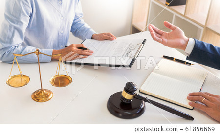 Legal counsel presents to the client negotiating a Legal counsel presents to the client negotiating a 61856669