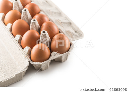 Fresh chicken eggs in pater tray isolated on white 61863098