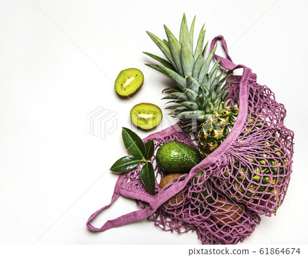 Mesh shopping bag with fruits Mesh shopping bag with fruits 61864674