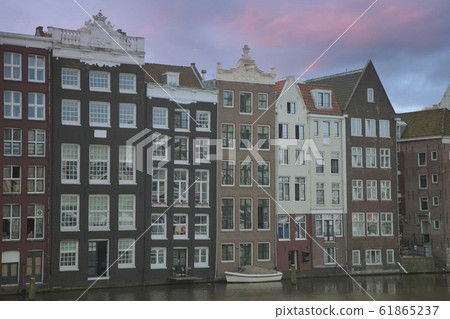 Traditional old buildings in Amsterdam Traditional old buildings in Amsterdam 61865237
