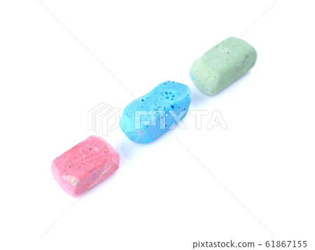 colored chalks on a white background colored chalks on a white background 61867155