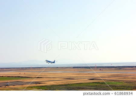 Airplane immediately after takeoff Airplane immediately after takeoff 61868934