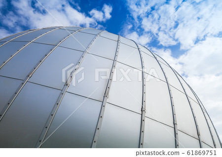 Shiny gray sphere made of metal plates 61869751