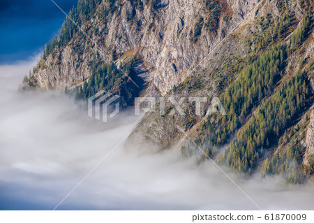 Autumn Alps mountain misty morning view from 61870009