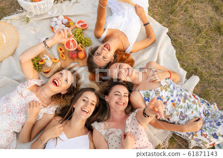 View from above. Company of beautiful girlfriends View from above. Company of beautiful girlfriends 61871143