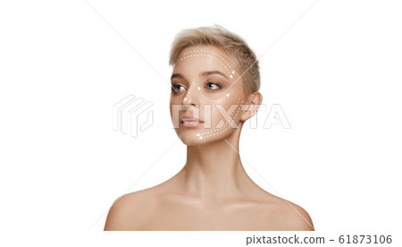 Beautiful female face with lighting up arrows isolated on white background Beautiful female face with lighting up arrows isolated on white background 61873106