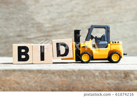 Toy forklift hold letter block d to complete word bid Toy forklift hold letter block d to complete word bid 61874216