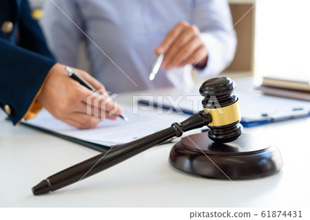 Female Lawyer explaining legal situation and 61874431