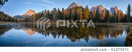 Beautiful autumn evening Lake Antorno and Three 61875071