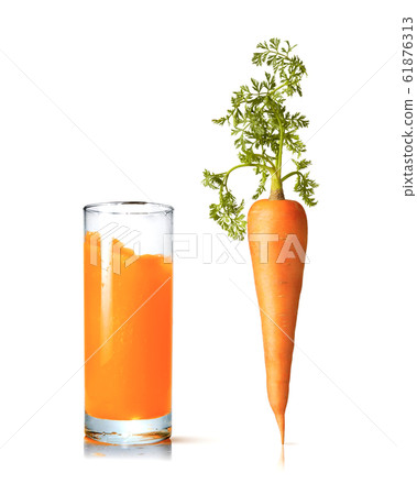 Juice glass with fresh organic carrot vegetable. Juice glass with fresh organic carrot vegetable. 61876313