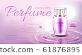 Perfume bottle on water surface with circles. 61876895