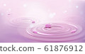 Circles on water and pink flower petals, waves 61876912