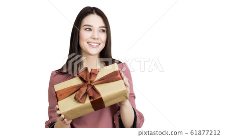 The girl accepts a gift from a loved one.. The girl accepts a gift from a loved one.. 61877212