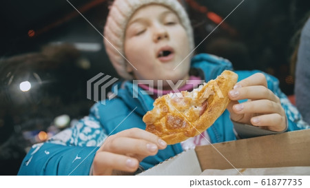 Child eat pizza cheese four. Close up of young girl woman eating pizza and chewing in outdoor restaurant. Kid children hands taking piece pizza. Child eat pizza cheese four. Close up of young girl woman eating pizza and chewing in outdoor restaurant. Kid children hands taking piece pizza. 61877735