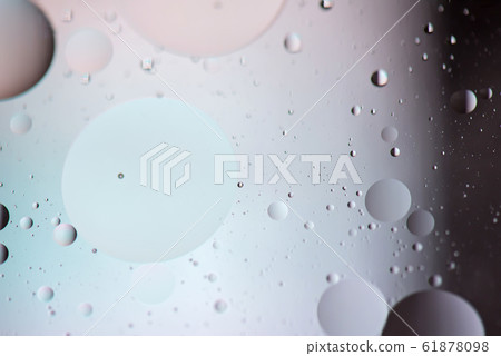 Defocused pastel and dark colored abstract background picture made with oil, water and soap Defocused pastel and dark colored abstract background picture made with oil, water and soap 61878098