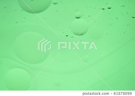 Green mint abstract background picture made with oil, water and soap Green mint abstract background picture made with oil, water and soap 61878099