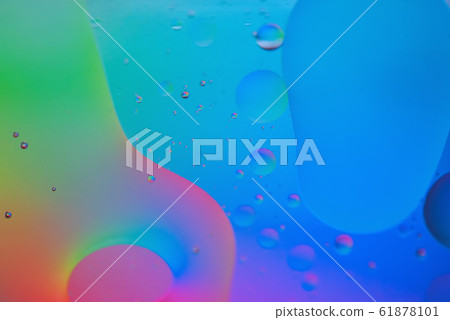 Rainbow abstract defocused background picture made with oil, water and soap Rainbow abstract defocused background picture made with oil, water and soap 61878101
