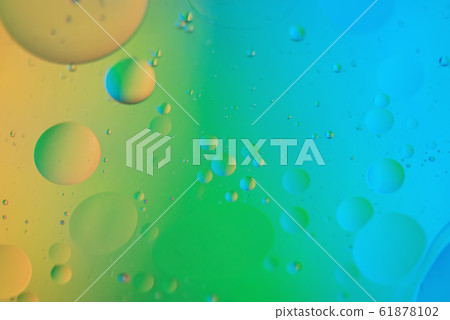 Rainbow abstract defocused background picture made with oil, water and soap Rainbow abstract defocused background picture made with oil, water and soap 61878102