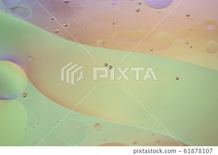 Defocused pastel colored abstract background picture made with oil, water and soap Defocused pastel colored abstract background picture made with oil, water and soap 61878107
