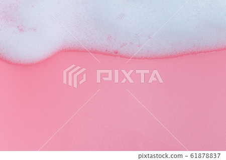 White foam on pink background White foam on pink background 61878837