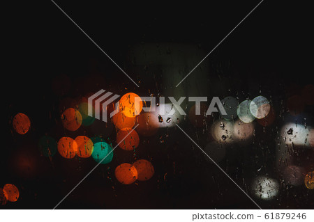 Water and rain drops on the glass 61879246