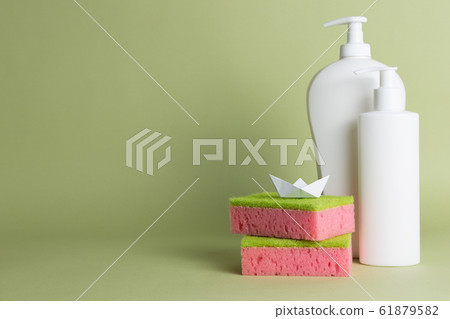 White plastic soap dispensers. Copy space. Place for text. 61879582